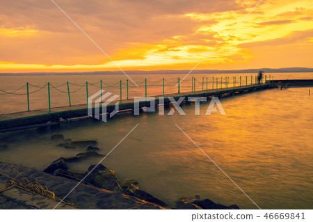 Sunset over lake Balaton. Siofok, Hungary, Europe Sunset over lake Balaton. Siofok, Hungary, Europe 46669841