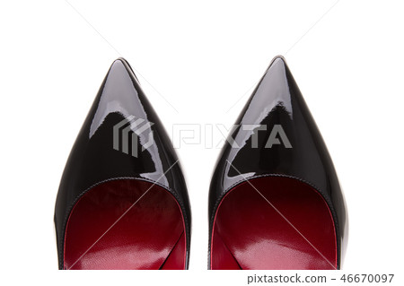 A pair of black patent leather shoes. A pair of black patent leather shoes. 46670097