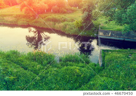 View of the countryside and river in the evening 46670450