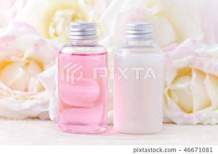 natural cosmetic bottles with fresh rose flowers, organic beauty treatment 46671081