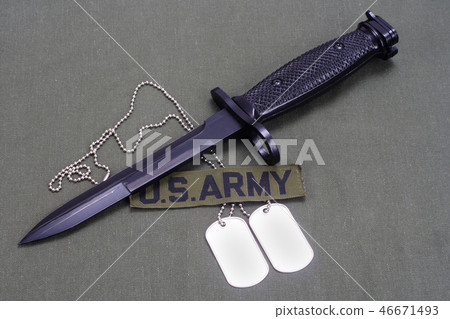 bayonet and dog tags on US ARMY uniform 46671493