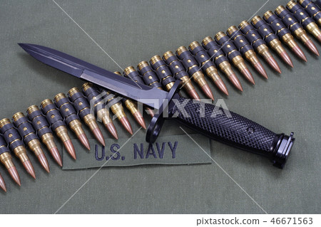 ammunition on US NAVY uniform background 46671563