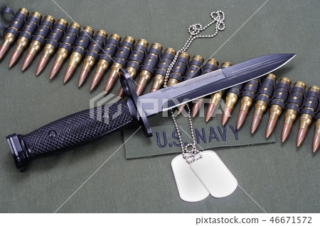 ammunition belt with dog tags on US NAVY uniform 46671572