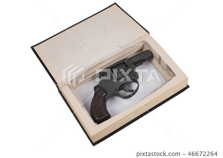 revolver gun hidden in a book 46672264