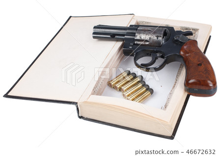 Revolver gun with cartridges hidden in a book Revolver gun with cartridges hidden in a book 46672632