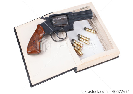 Revolver gun with cartridges hidden in a book Revolver gun with cartridges hidden in a book 46672635