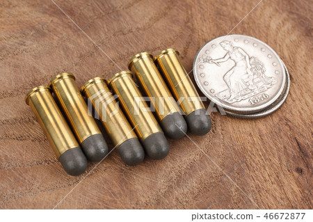 Cartridges and Silver Dollar Wild West period Cartridges and Silver Dollar Wild West period 46672877