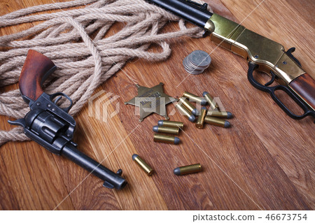 Wild west rifle, ammunition and sheriff badge 46673754
