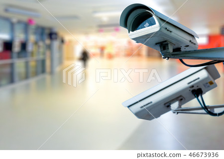 CCTV camera with blurred coloreful background. CCTV camera with blurred coloreful background. 46673936