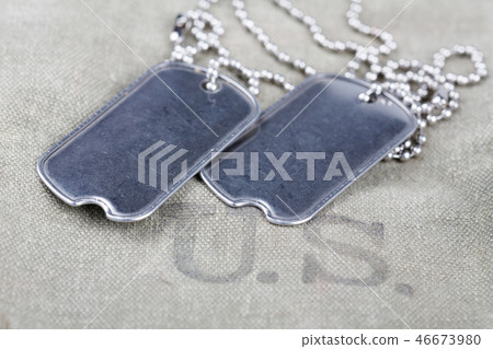 blank dog tags on us army uniform world war two  46673980