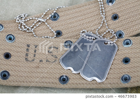 blank dog tags on us army uniform world war two  46673983