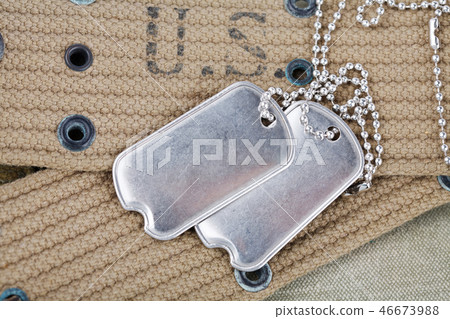 blank dog tags on us army uniform world war two  46673988