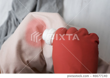 Gloved hand pouring the washing liquid Gloved hand pouring the washing liquid 46677140