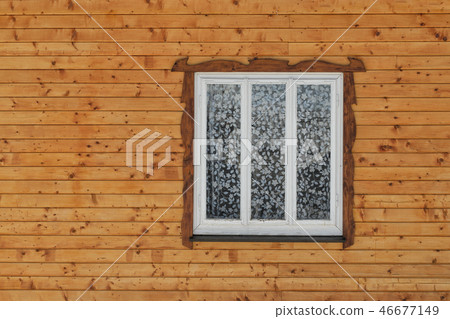 White wooden window in the wall White wooden window in the wall 46677149