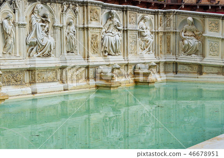 Fonte Gaia is monumental fountain in Siena. Italy Fonte Gaia is monumental fountain in Siena. Italy 46678951