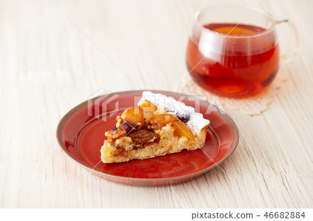 Tart and tea with dried fruits and nuts 46682884