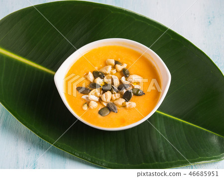 Bean squash creamy soup served with seeds and nuts 46685951