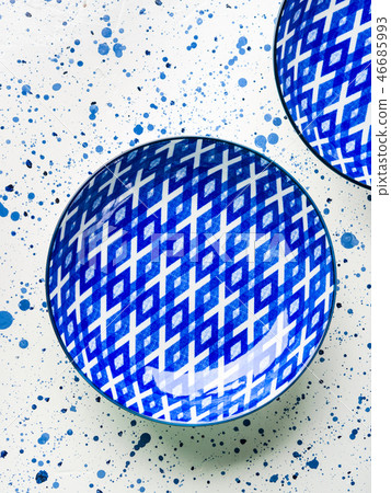 Empty porcelain china dish on white background Empty porcelain china dish on white background 46685993