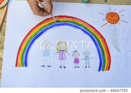 Happy family concept. Child draws on a sheet Happy family concept. Child draws on a sheet 46687395
