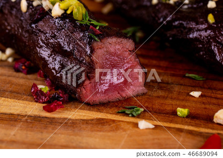 A piece of meat in a section of weak pro-frying wi A piece of meat in a section of weak pro-frying wi 46689094
