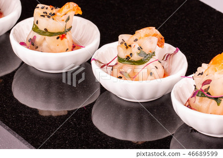 Sacks from the test with shrimps and sesame 46689599