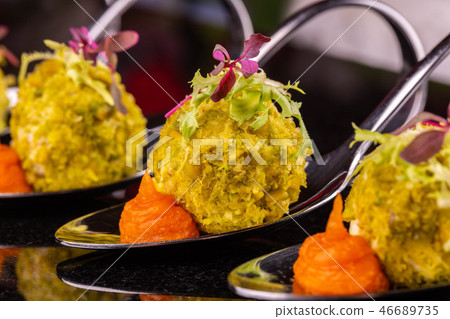 Vegetable balls with grated carrots and greens 46689735