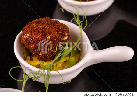 Cabbage in crackers with chips from onions 46689741