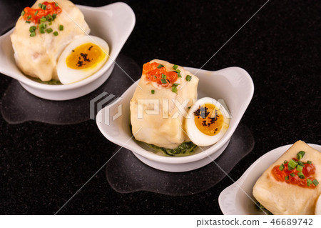 A Siberian salmon in sauce with quail egg, red cav A Siberian salmon in sauce with quail egg, red cav 46689742