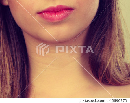 Detailed closeup of woman red lips Detailed closeup of woman red lips 46690773