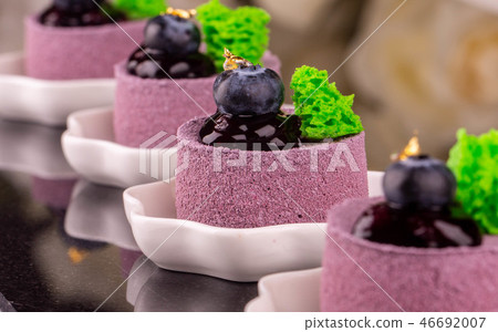 A chocolate dessert with currant and chocolate  46692007