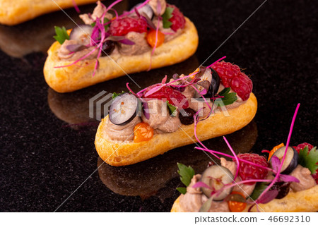 Brusketa with paste from a liver of a guinea fowl  46692310