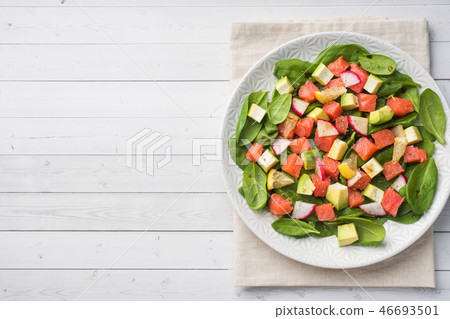 Poke Hawaiian salad with salmon, avocado spinach Poke Hawaiian salad with salmon, avocado spinach 46693501