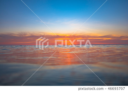 the sun going down to the sea 46693707