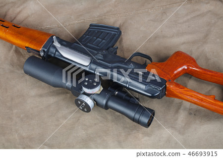 SVD sniper rifle on khaki canvas SVD sniper rifle on khaki canvas 46693915