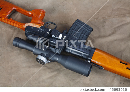 SVD sniper rifle on khaki canvas 46693916