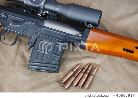 SVD sniper rifle on khaki canvas 46693917