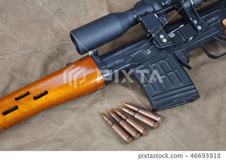 SVD sniper rifle on khaki canvas 46693918