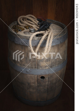 Old western revolver with cartridges and dollar Old western revolver with cartridges and dollar 46694043