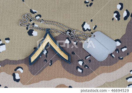 US ARMY Private rank patch and dog tags on uniform 46694529