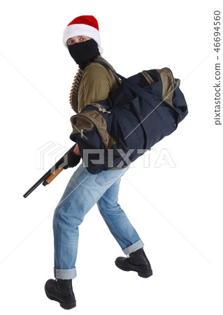 robber in a cap of Santa Claus with shotgun 46694560