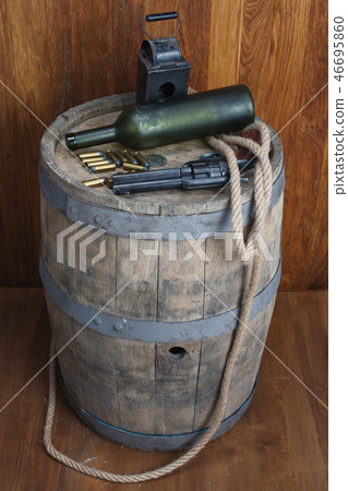 Old western revolver with cartridges 46695860