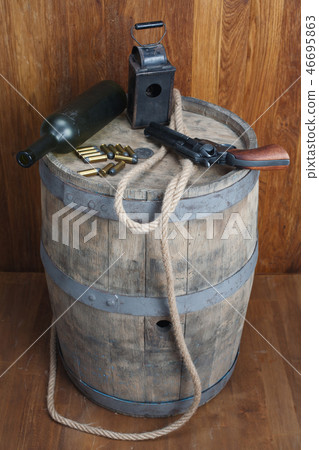 Old western revolver with cartridges 46695863
