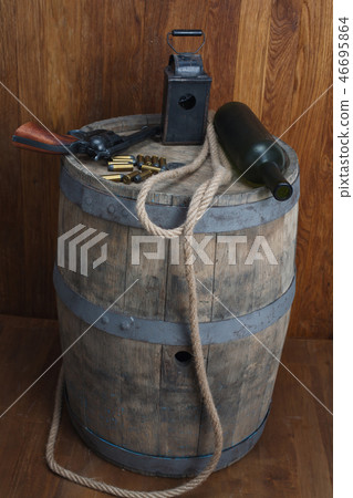 Old western revolver with cartridges 46695864