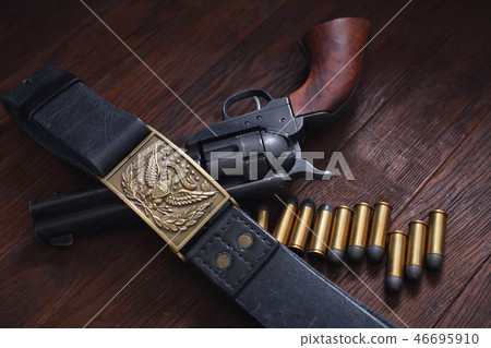 Old revolver with cartridges Old revolver with cartridges 46695910