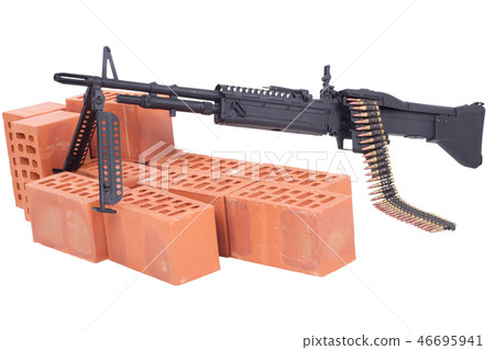 machine gun with amminition tape on position 46695941