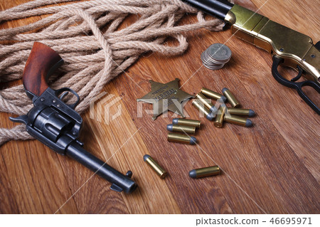 Wild west rifle, ammunition and sheriff badge 46695971