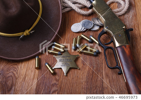 Wild west rifle, ammunition and sheriff badge 46695973