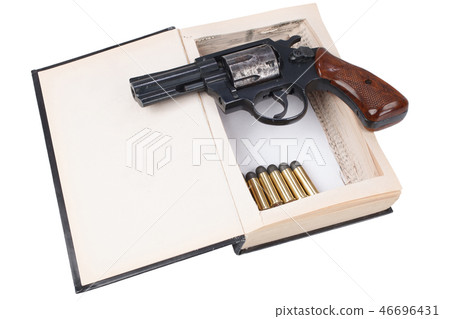 revolver gun with cartridges hidden in a book 46696431