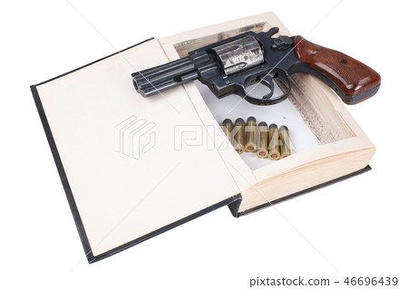 revolver gun with cartridges hidden in a book 46696439