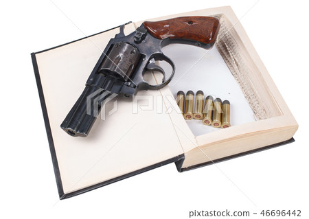 revolver gun with cartridges hidden in a book 46696442